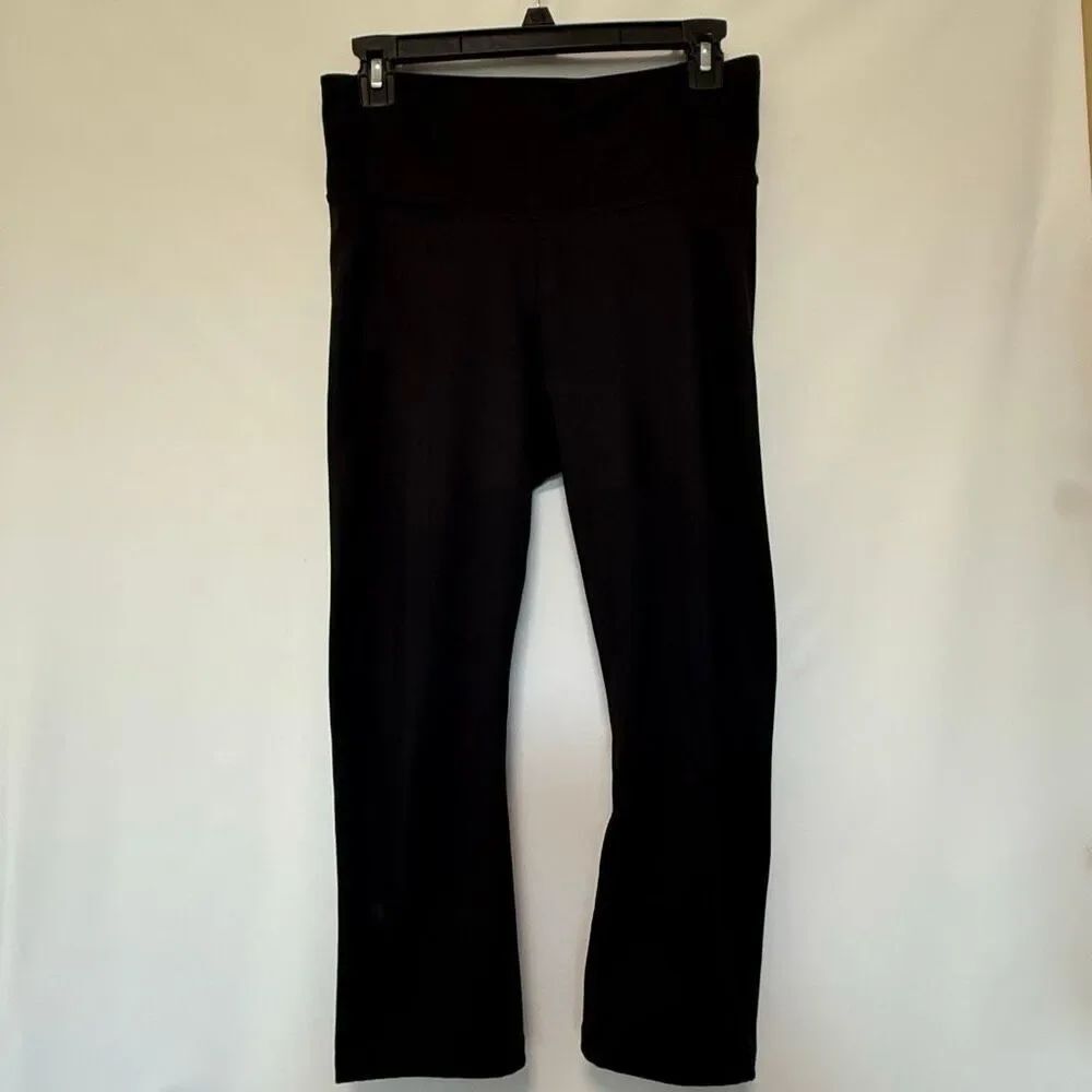 All in motion black legging size medium. 21" length
